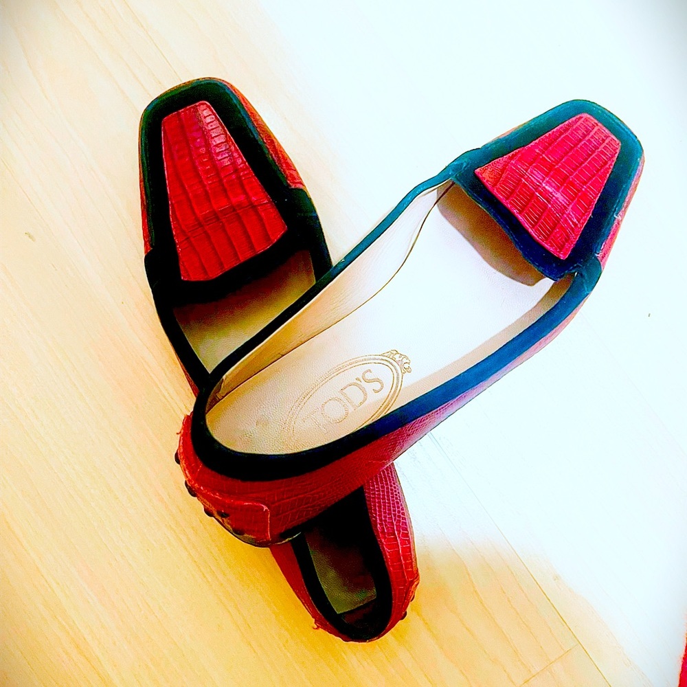 Shoes are a burgundy and black color.
